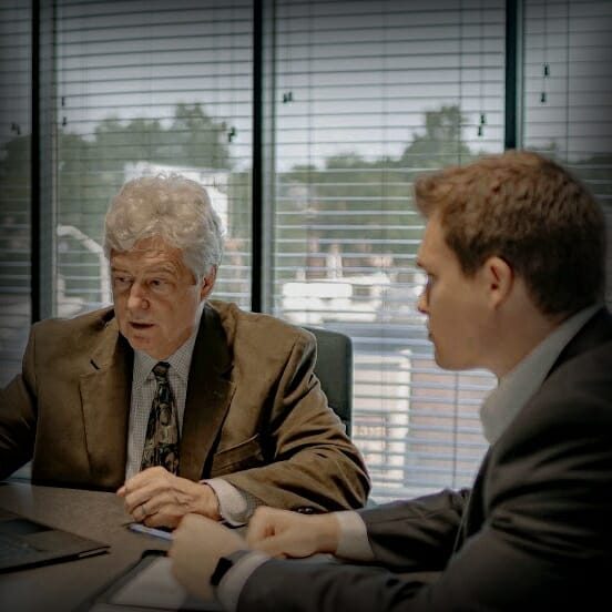 Lawrence York and John York in a meeting